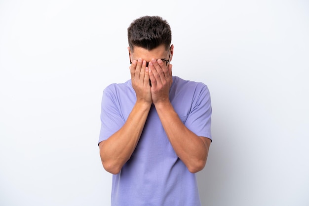 Young caucasian man isolated on white background with tired and sick expression