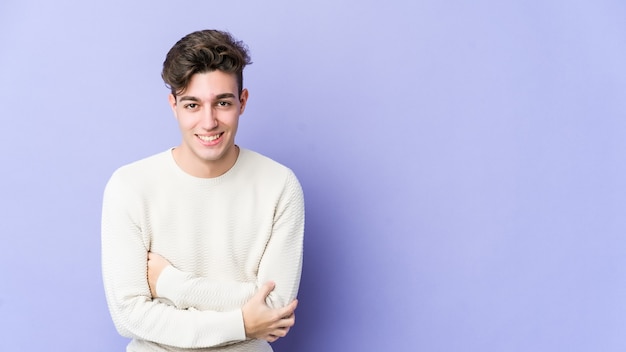 Young caucasian man laughing and having fun.