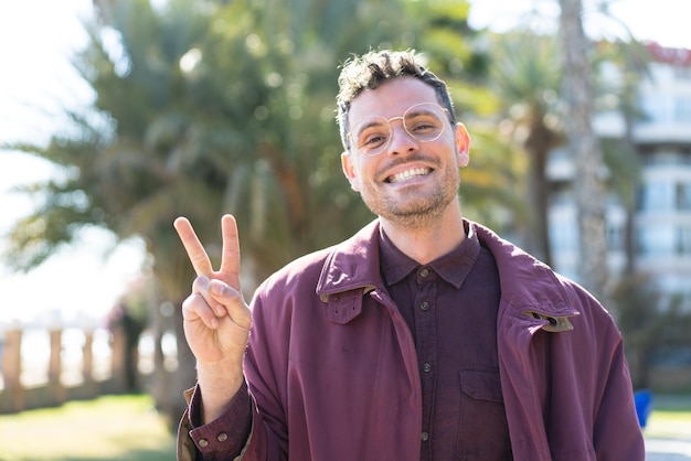 Young caucasian man at outdoors