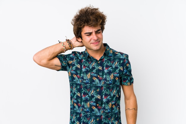 Young caucasian man wearing a flower t-shirt isolated suffering neck pain due to sedentary lifestyle.