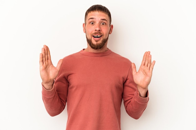 Young caucasian man with diastema isolated on white background having an idea, inspiration concept.