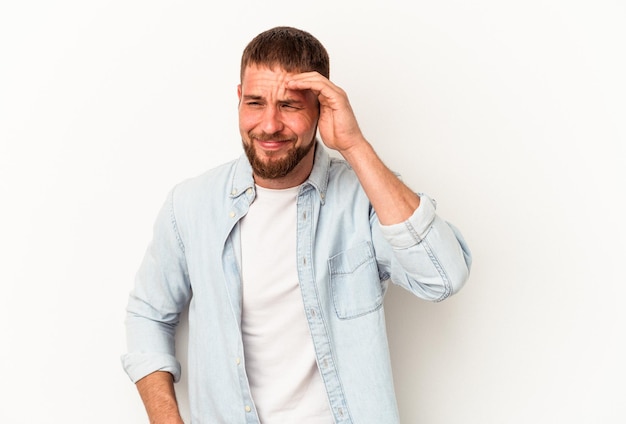 Young caucasian man with diastema isolated on white background joyful laughing a lot. Happiness concept.