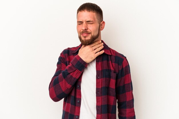 Young caucasian man with diastema isolated on white background suffers pain in throat due a virus or infection.
