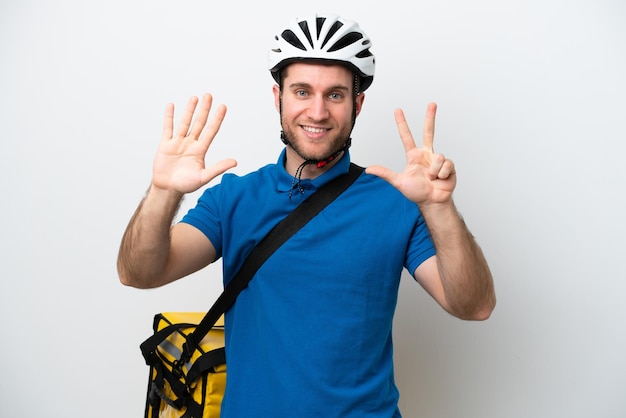 Young caucasian man with thermal backpack isolated on white background counting eight with fingers