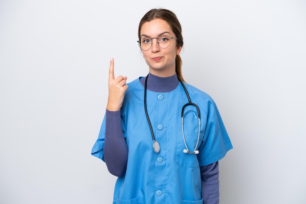 Young caucasian nurse woman isolated on white background pointing with the index finger a great idea