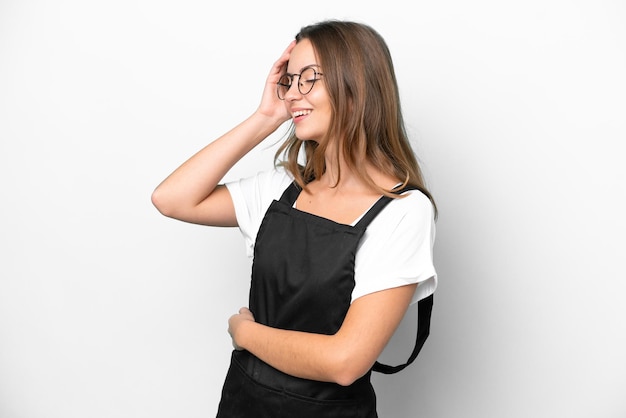 Young caucasian restaurant waiter woman isolated on white background has realized something and intending the solution