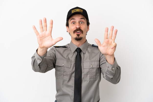 Young caucasian security man isolated on white background counting nine with fingers