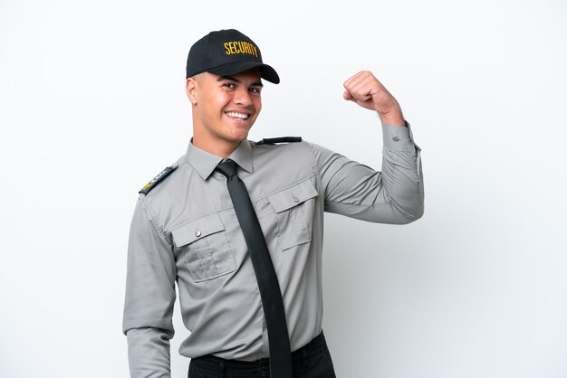 Young caucasian security man isolated on white background doing strong gesture