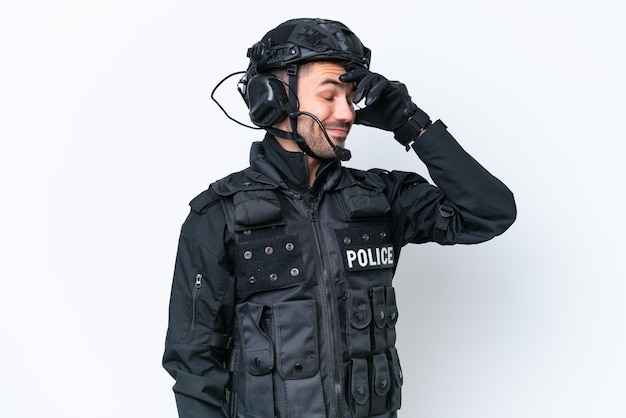 Young caucasian SWAT man isolated on white background laughing