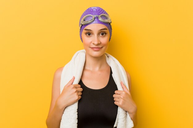 Young caucasian swimmer woman