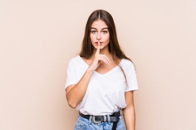 Young caucasian woman asking for silence.