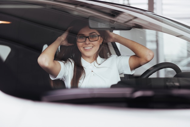 young caucasian woman in a car