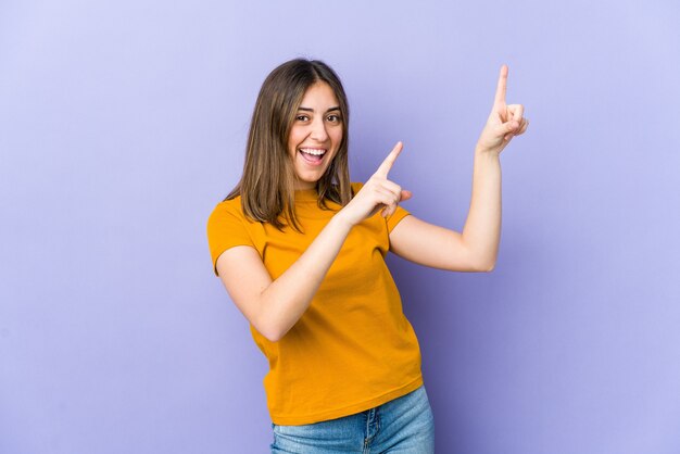 Young caucasian woman dancing and having fun.