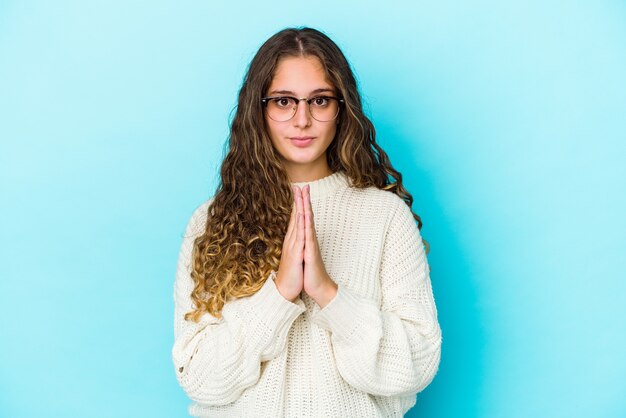 Young caucasian woman expressing emotions isolated