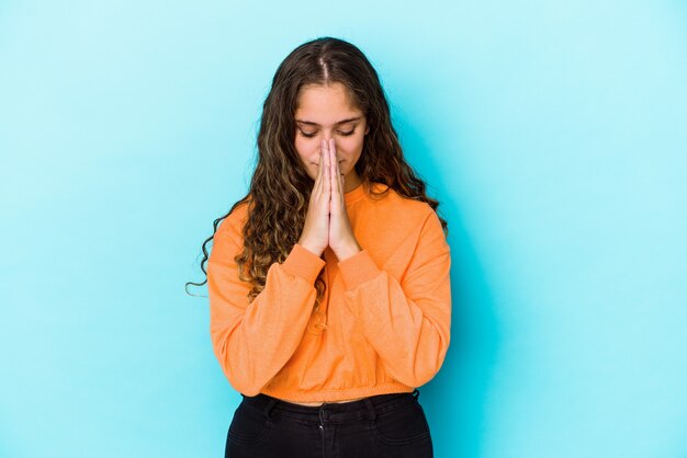 Young caucasian woman expressing emotions isolated