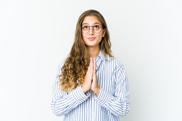 Young caucasian woman expressing emotions isolated