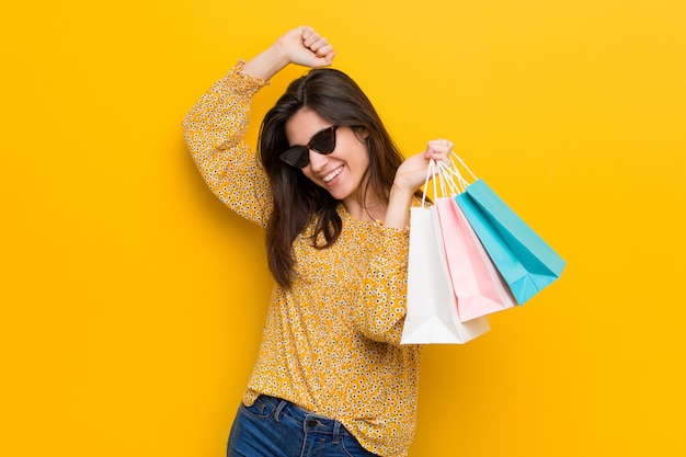 Young caucasian woman going to shopping