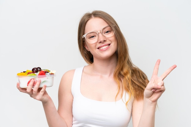 Young caucasian woman over isolated background