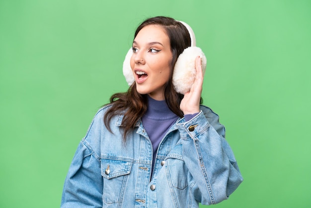 Young caucasian woman over isolated background