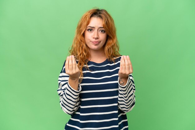 Young caucasian woman over isolated background