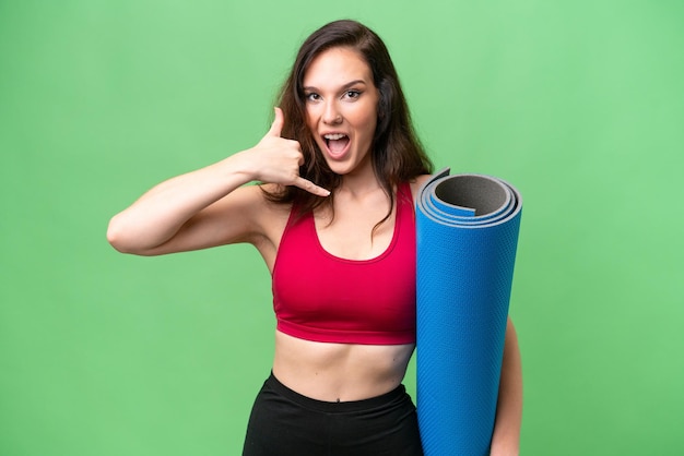 Young caucasian woman over isolated background