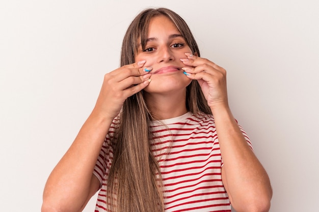 Young caucasian woman isolated on white background doubting between two options.