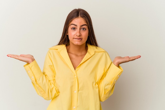 Young caucasian woman isolated on white background feeling energetic and comfortable rubbing hands confident