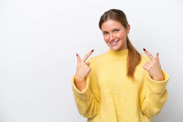 Young caucasian woman isolated on white background giving a thumbs up gesture