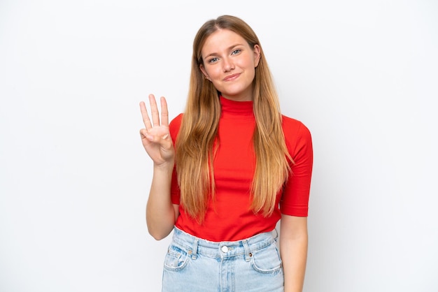 Young caucasian woman isolated on white background happy and counting three with fingers