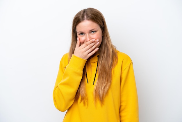 Young caucasian woman isolated on white background happy and smiling covering mouth with hand