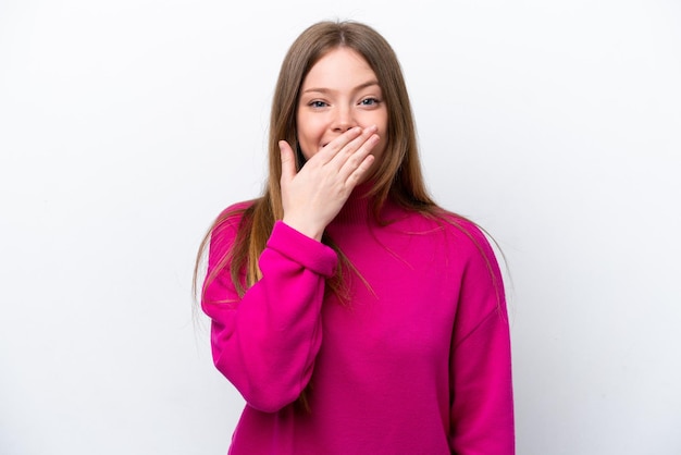 Young caucasian woman isolated on white background happy and smiling covering mouth with hand