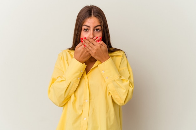 Young caucasian woman isolated on white background having a liver pain, stomach ache.