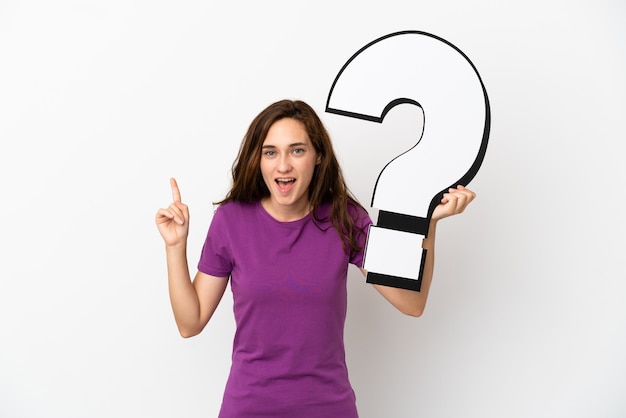 Young caucasian woman isolated on white background holding a question mark icon