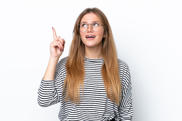 Young caucasian woman isolated on white background intending to realizes the solution while lifting a finger up