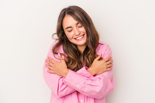 Photo young caucasian woman isolated on white background laughing and having fun.