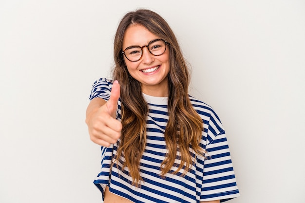 Young caucasian woman isolated on white background smiling and raising thumb up