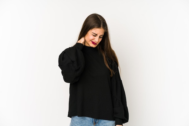 Young caucasian woman isolated on white background suffering neck pain due to sedentary lifestyle.