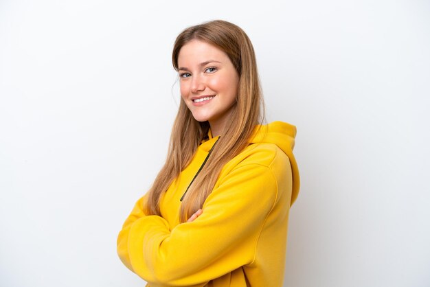 Young caucasian woman isolated on white background with arms crossed and looking forward