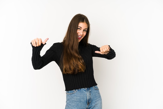 Young caucasian woman isolated on white raising both thumbs up, smiling and confident.