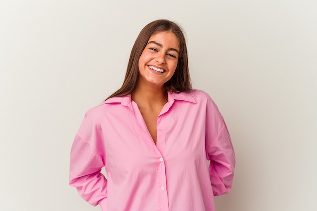 Young caucasian woman isolated on white wall happy, smiling and cheerful.