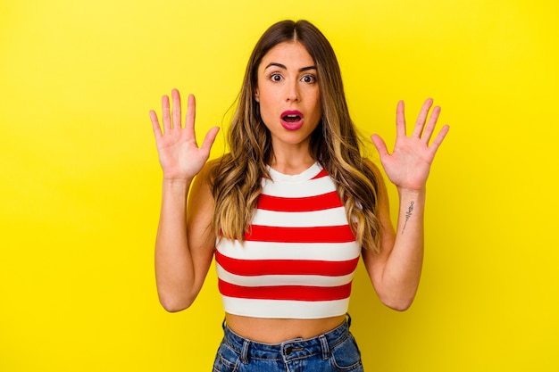 Young caucasian woman isolated on yellow background having an idea, inspiration concept.