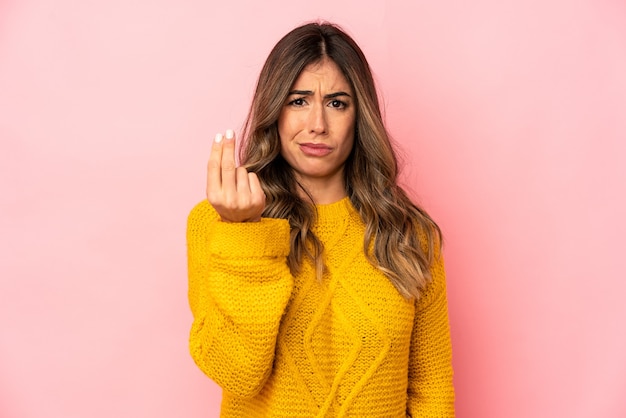 Young caucasian woman showing that she has no money.