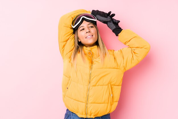 Young caucasian woman wearing a ski clothes