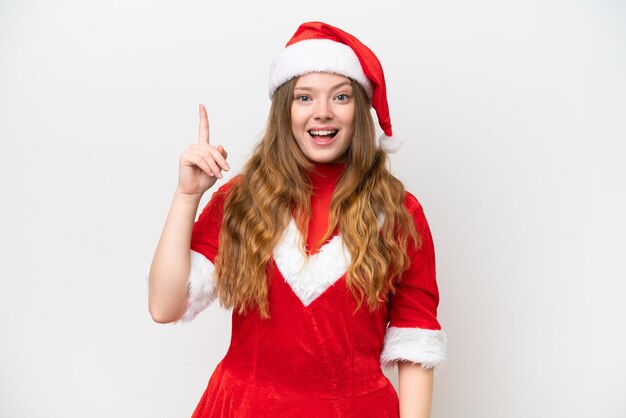 Photo young caucasian woman with christmas dress isolated on white background intending to realizes the solution while lifting a finger up