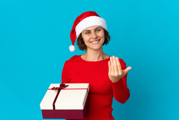 Young caucasian woman with gift
