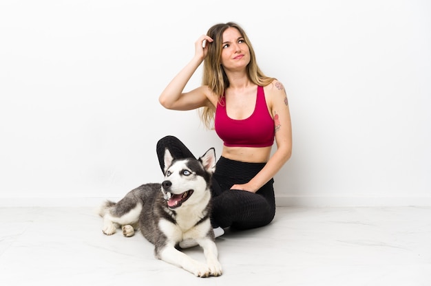 Young caucasian woman with her dog