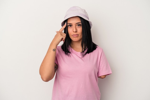 Young caucasian woman with one arm isolated on white background pointing temple with finger, thinking, focused on a task.