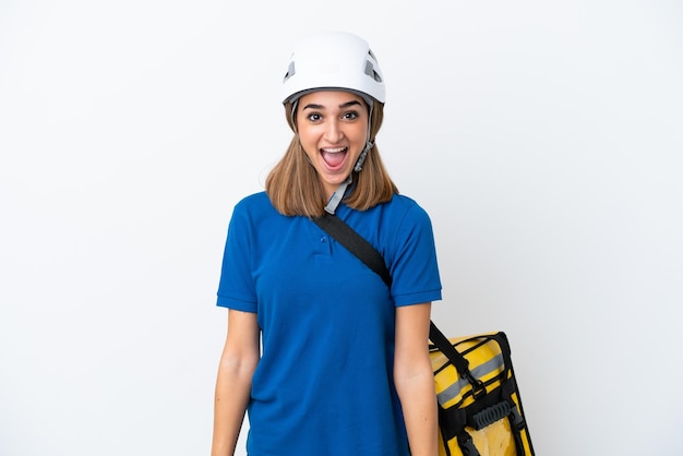 Young caucasian woman with thermal backpack isolated on white background with surprise facial expression