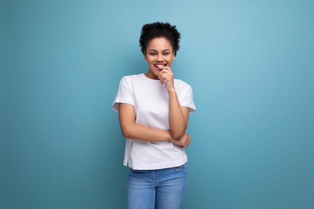 Young charming latin woman dressed in white tank top with blank space for logo printing