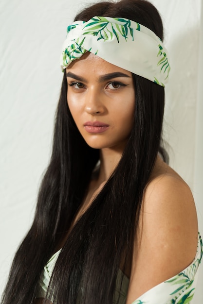 Young charming woman wearing beach clothes